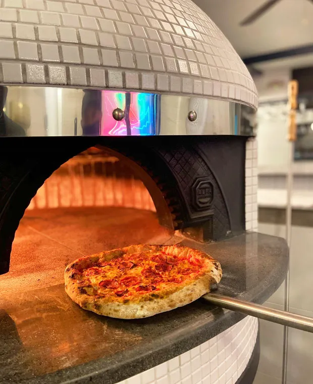 Pizza cooking in Napoli oven